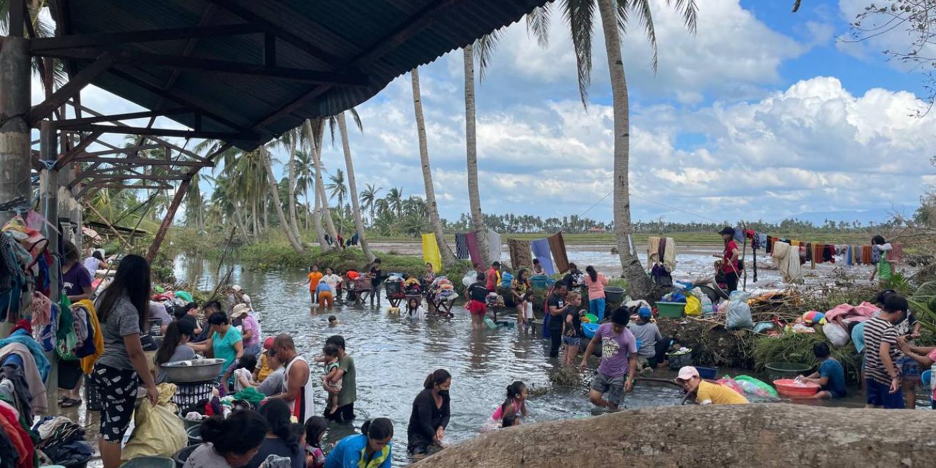 Residents of Barangay Itum and nearby barangays in Matalom, Leyte have resorted to bathing and doing laundry in the river. Data from the LGU Matalom show that at least 36,000 people were affected while 90% of infras were damaged. Photo by: Leah Payud/Oxfam